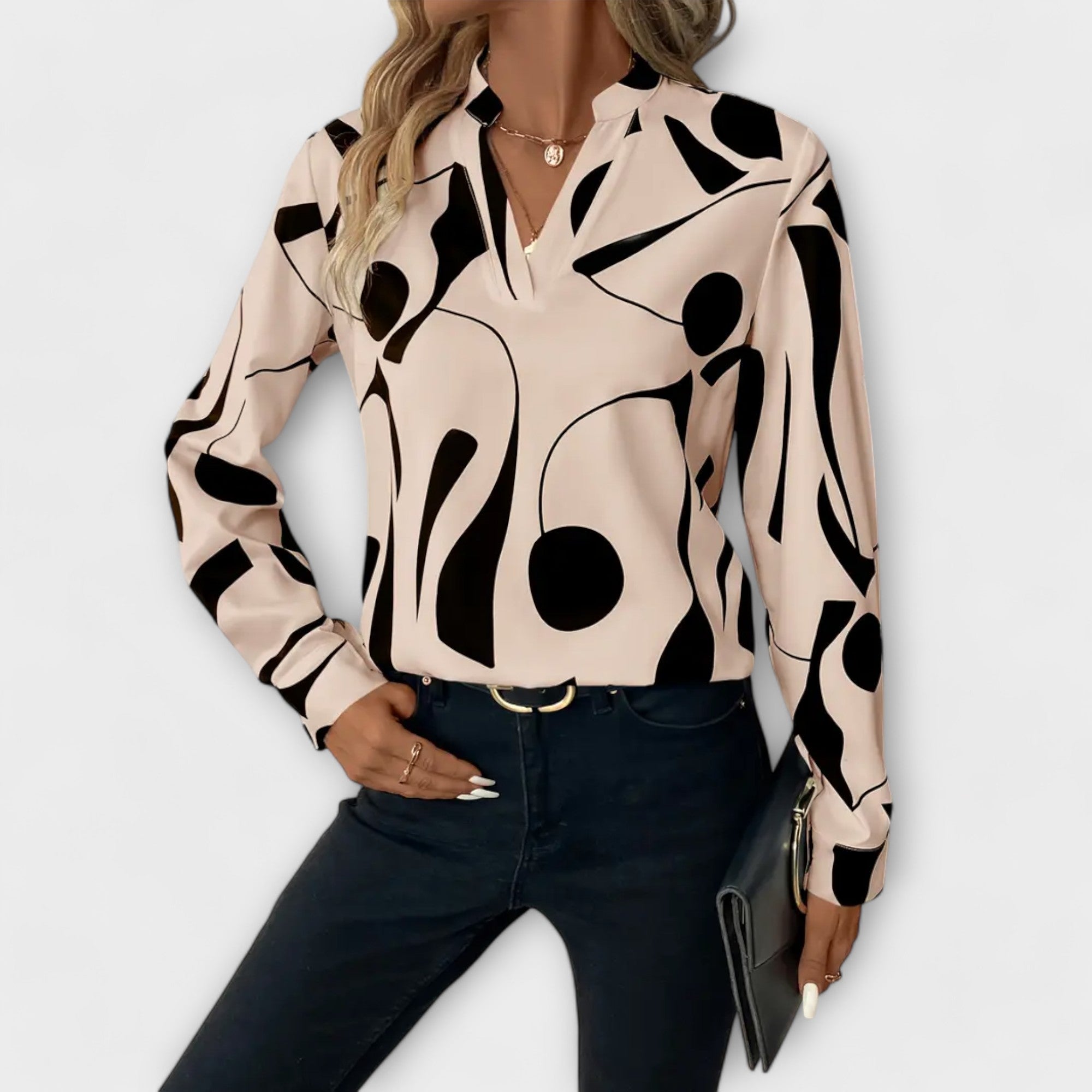Elegant blus med lång ärm och spetsig halsringning