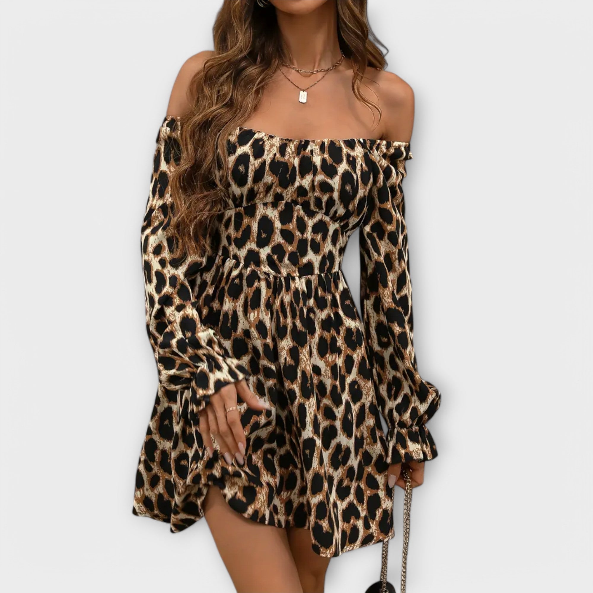 Charmig Klänning med Leoprint