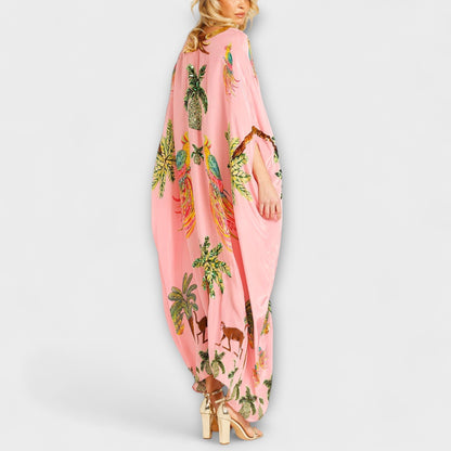 Linda - Iögonfallande klänning med off-shoulder-design och kokosnötsträdsmönster